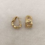 Rough smooth cross earring